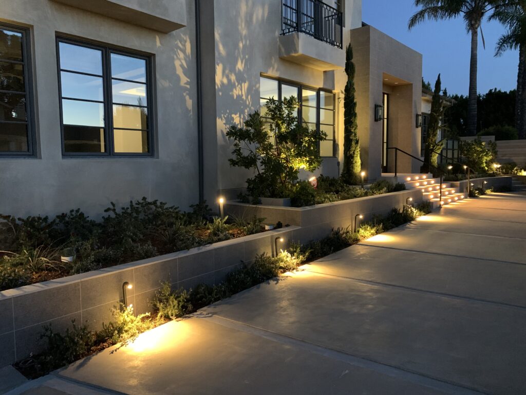 pathway lights installed along walkway at night