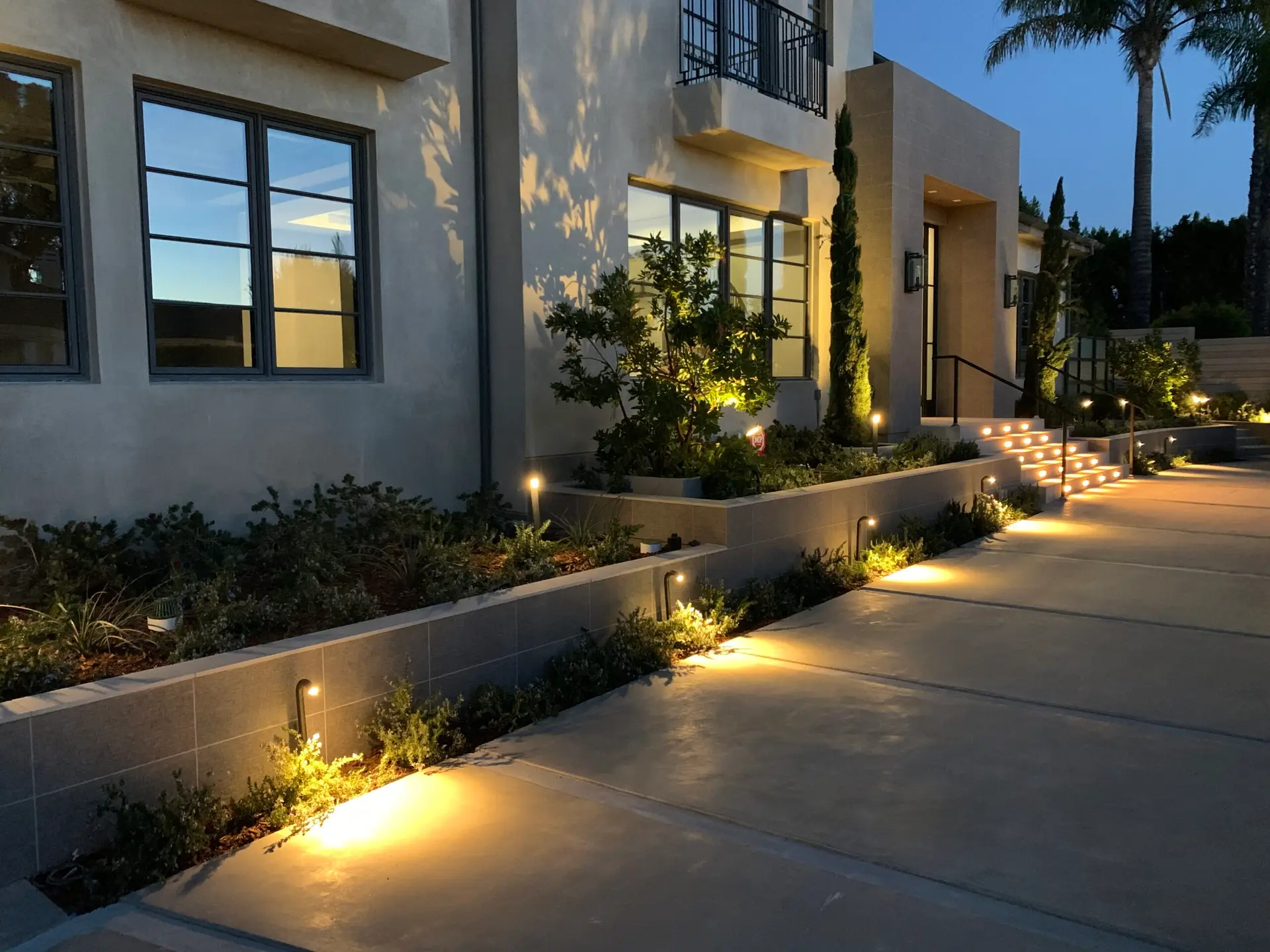 pathway lights installed along walkway at night